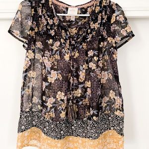 Loose flowy top with floral detail